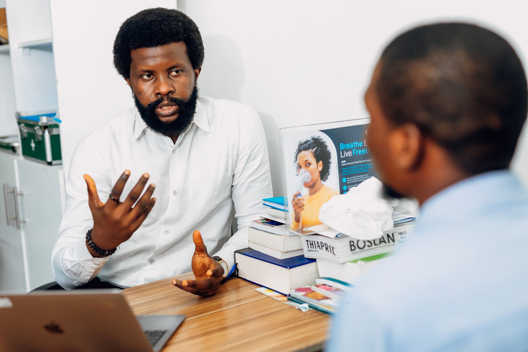 A doctor in consultation with a patient